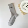 Calcetines nuevos de otoño e invierno hasta la mitad de la pantorrilla para mujer, desodorantes, absorbentes de sudor, tipo letra, deportivos, sin bolitas, calcetines de moda, calcetines para pareja, hombres