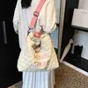 Otoño 2026 Nuevo Bolso de Gran Capacidad para Estudiantes y Viajes Diarios Bolso Tote Portátil para Mujer Bolso de Hombro con Bordado de Letras Bolso Cruzado