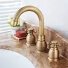 Grifo de lavabo de cobre puro estilo europeo pastoral estilo americano antiguo retro dividido doble tres agujeros presurizado caliente y frío