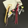 Zapatos Estilo Deportivo Llavero de Tenis Nicho Gama Alta Serie Miu Colgante de Cuerda Trenzada para Bolso Venta al por Mayor