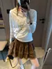 Además, la nueva camiseta de otoño estilo coreano con bordado de lazo y mangas raglán texturizadas MQ1614