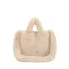 Outono de 2026 Novo Estilo Bolsa de Mão Fofa de Ombro Único Bolsa Tote Transversal Peluda da Moda para Mulheres Bolsa de Pelúcia Texturizada Casual