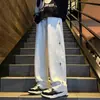Pantalones casuales estampados estilo americano, nueva colección otoño/invierno, ropa deportiva de moda, pantalones versátiles de corte recto holgado para hombre