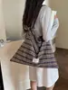 Bolso de mano de cuadros de moda 2026 nuevo modelo gran capacidad versátil bolso de mano para ir al trabajo bolso de lona bolsa de compras transfronterizo