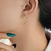 Promoción Transfronteriza Pendientes Sencillos Moda Europea y Americana Pendientes Retorcidos Pendientes Personalizados para Mujer Venta Directa de Fábrica