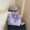 Bolsa de mano de gran capacidad para mujer, nuevo estilo verano 2026, bolso de hombro casual, bolsa para clase de estudiante universitario