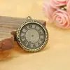 Accesorios de joyería al por mayor 26 mm reloj redondo marca retro DIY colgante hecho a mano accesorios de aleación
