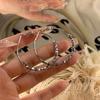 Pendientes de anillo liso transfronterizos europeos y americanos con aguja de plata, pendientes de nicho de viento frío, pendientes de temperamento de moda, lujo ligero, sentido de alta gama