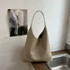 Bolso de mano tejido de lujo ligero de alta gama, nicho, para mujer, nuevo estilo 2026, moderno, popular de verano, para ir al trabajo, bolso de hombro único, tote