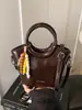 Bolsas Exquisitas de Nicho para Mujer 2026 Nuevo Modelo Bolso de Hombro Cruzado Versátil de Gama Alta Bolso de Mano Simple Súper Popular