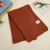 Bufanda tejida de color liso más vendida en stock, bufanda de hilo de terciopelo ártico, lujo ligero con un toque de alta gama, engrosada y cálida, bufanda estilo universitario