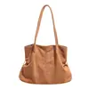 Bolsa tote mais vendida internacionalmente, bolsa de mão em camurça, nova coleção outono/inverno 2026, estilo retrô, grande capacidade, bolsa de ombro para o dia a dia, atacado