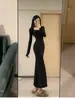 Vestido negro de cola de pez con estampado de flor de loto para mujer, vestido de punto de manga larga para principios de otoño, adecuado para figuras en forma de pera, vestido ajustado estilo Berkeley