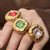 Anillo Misterioso de Acero Inoxidable Vidrio de Color Piedra Ojo de Tigre Color Oro 18K Conservación del Color Diseño de Nicho Lujo Ligero Anillo Retro