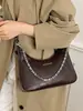 Yozzi 2026 nuevo modelo de principios de otoño, bolso de alta gama elegante moderno, bolso de hombro y axila versátil casual con cadena de moda