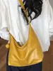 Bolso retro para mujer Shuai Mi Jia 2026 verano nuevo color liso bandolera de un solo hombro bolso de axila bolso de mano casual para commuting para mujer