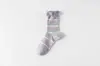 Calcetines Rayados de Bloques de Color Sin Costuras con Puño Doble Estilo Miu Etiqueta de Letra de Moda con Puño de Burbuja de Malla Calcetines de Caña Media
