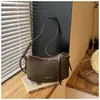Bolso de mano pequeño de alta gama para mujer, nuevo bolso cruzado versátil de moda 2026, bolso de hombro popular de venta caliente, bolso tipo silla de montar súper moderno