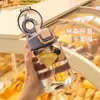 Novo copo de plástico popular da moda copo de água portátil para esportes ao ar livre copo de viagem para estudantes com tampa de abrir copo espacial simples e criativo