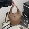 Bolso de Mano de Cuero PU Suave para Mujer 2026 Principios de Otoño Bolso Cubo Casual Versátil Bolso de Hombro Cruzado Bolso de Color Sólido para Mujer