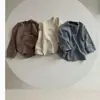 Camiseta de manga larga tipo suéter para primavera y otoño para niños, nueva camiseta casual versátil para niños, niños y niñas, top de cuello redondo para niñas