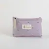 Bolsa de maquiagem de lona com estampa de letras estilo Ins, à prova d'água e portátil, adequada para estudantes como estojo de lápis ou organizador de artigos de higiene pessoal para viagens