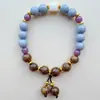 Pulseira de Madeira Asa de Frango Esmaltada Novo Estilo para Mulheres, Joia de Mão para Casal Estilo Chinês Retro Nicho High-End Barraquinha de Feira Noturna