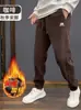 Pantalones deportivos para hombre de marca de moda transfronteriza, estilo otoño e invierno, engrosados y con forro polar, pantalones jogger casuales de corte holgado para hombre
