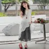 Vestido T-shirt de Encaje de Verano Conjunto para Niñas Estilo Delgado 2026 Modelo Nuevo Conjunto de Tres Piezas con Falda a Cuadros para Niños Grandes