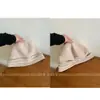 Gorro holgado y extragrande nuevo de 2026, estilo retro, gorro de punto negro de alta gama con bordes enrollados, diseñado para hacer que el rostro parezca más pequeño, un gorro de invierno elegante
