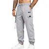 2026 Amazon Más Vendido Otoño Sencillo Retro Americano Gabardina Casual para Viajar Pantalones Jogger Cargo de Múltiples Bolsillos