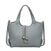 Elegante bolso de mano con patrón de lichi, bolso de hombro versátil de colores texturizados para primavera-verano, bolso cruzado de diseño para el trabajo, moderno