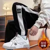 Pantalones largos de pana con forro polar para hombre, otoño e invierno, estilo Hong Kong de alta costura moderno, joggers deportivos de peso pesado, pantalones casuales con puños elásticos