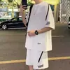 Traje deportivo casual para hombres jóvenes, marca de moda de verano, talla grande, conjunto de dos piezas holgado con mangas cortas y shorts