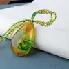 Cadena de suéter Po de seda verde modelo de 10 yuan puesto de suministro exposición venta rápida modo perezoso para enviar grabación cadena de suéter