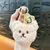 Llavero de peluche lindo transfronterizo, colgante de bolsa de moda, llavero de coche, regalo de máquina de garras, venta al por mayor de comercio exterior