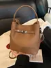 Bolso Cubo Versátil Retro de Nicho Estilo Coreano para Mujer 2025 Nuevo Bolso de Hombro Casual Bolso de Mano Simple de Moda