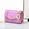 Venta Directa de Fábrica Bolsos para Mujer 2026 Nuevo Modelo Bolso Pequeño Cuadrado de Hombro Cruzado Moda Versátil Cadena Tejida Cuero Brillante Bolso para Mujer