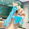 Pingente de estrela de cinco pontas, areia movediça e frangipani, decoração para bolsa e carro, mercadoria de suporte para leque, chaveiro, presente para o Dia do Professor