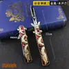 Arma de aleación de dibujos animados Dragón Dorado arma de rebote modelo de metal práctica estudiantil cuchillo mariposa sin hoja cortante