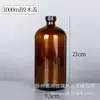 Disponibles en stock varias especificaciones de botellas de spray de vidrio, botellas Boston multicolor, botellas para desinfectante, botellas para aceites esenciales, botellas para cosméticos.