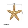 Broche de Estrela-do-Mar com Pérola em Aço Inoxidável Dourado 18K Transfronteiriço, Estilo Personalizado Tendência, Broche Feminino Fresco e Elegante com Toque de Alto Padrão e Luxo Leve