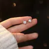 Joyería de Plata Yongyi Plata de Ley S925 Corazón Circonita Rodeando Meteorito Aretes Femeninos Bosque Lindo Estilo Ins Aretes de Nicho