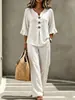 En stock y listo para enviar, conjunto de dos piezas para mujer de comercio exterior transfronterizo europeo y americano con top de manga tres cuartos con volantes y cuello en V abotonado y pantalones largos