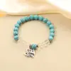 Pulsera de cuentas redondas de turquesa con cuentas de cristal blanco de moda diseño literario joyería de cuentas para mano de dama nicho venta al por mayor