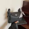 Bolso cruzado de cuero de un solo hombro estilo francés U2025, nuevo y moderno, diseño de nicho, con un toque de alta gama, popular bolso de mano tipo almohada
