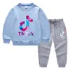 Conjunto de Ropa Infantil Transfronterizo Nuevo Primavera y Otoño 2026: Conjunto de Dos Piezas de Sudadera y Pantalón Largo para Niños, Atuendo de Algodón de Manga Larga para Bebé de Exportación