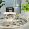 Serie Jungla de H Juego de Cuatro Piezas de Vajilla Europea Occidental Taza de Café y Platillo Plato Occidental Vajilla de Porcelana Ósea para el Hogar Venta al por Mayor