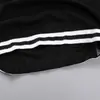 Moda, nuevos shorts deportivos, 48 cm de largo, tela birdseye, que absorben la humedad, de secado rápido, shorts de gimnasio en blanco y negro al por mayor