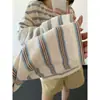 Serie sun miu hebilla de cuerno camisa Henley retro perezoso a rayas manga larga holgada camiseta mujer botón casual nuevo estilo